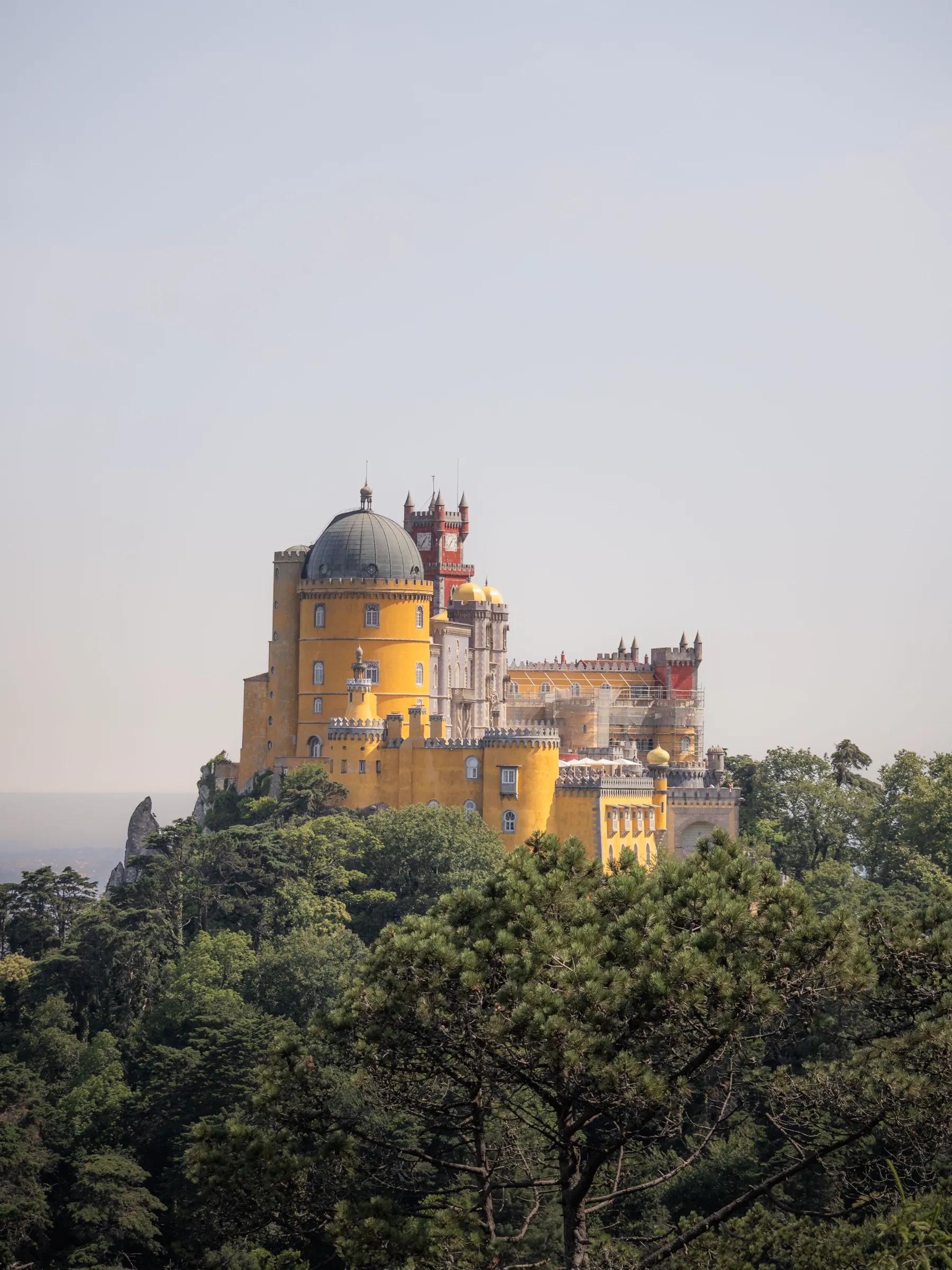Pena Palace surrounded by forest in Sintra, Portugal